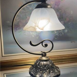 Art Nouveau style frosted lily pad table lamp with a bronze-colored metal base
